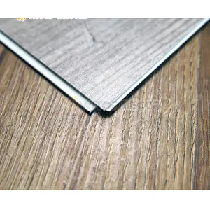 Revêtement UV Plancher en vinyle à chevrons SPC Conception en bois Carreaux de vinyle Planche Plastique Cliquez Revêtement de sol pour appartement