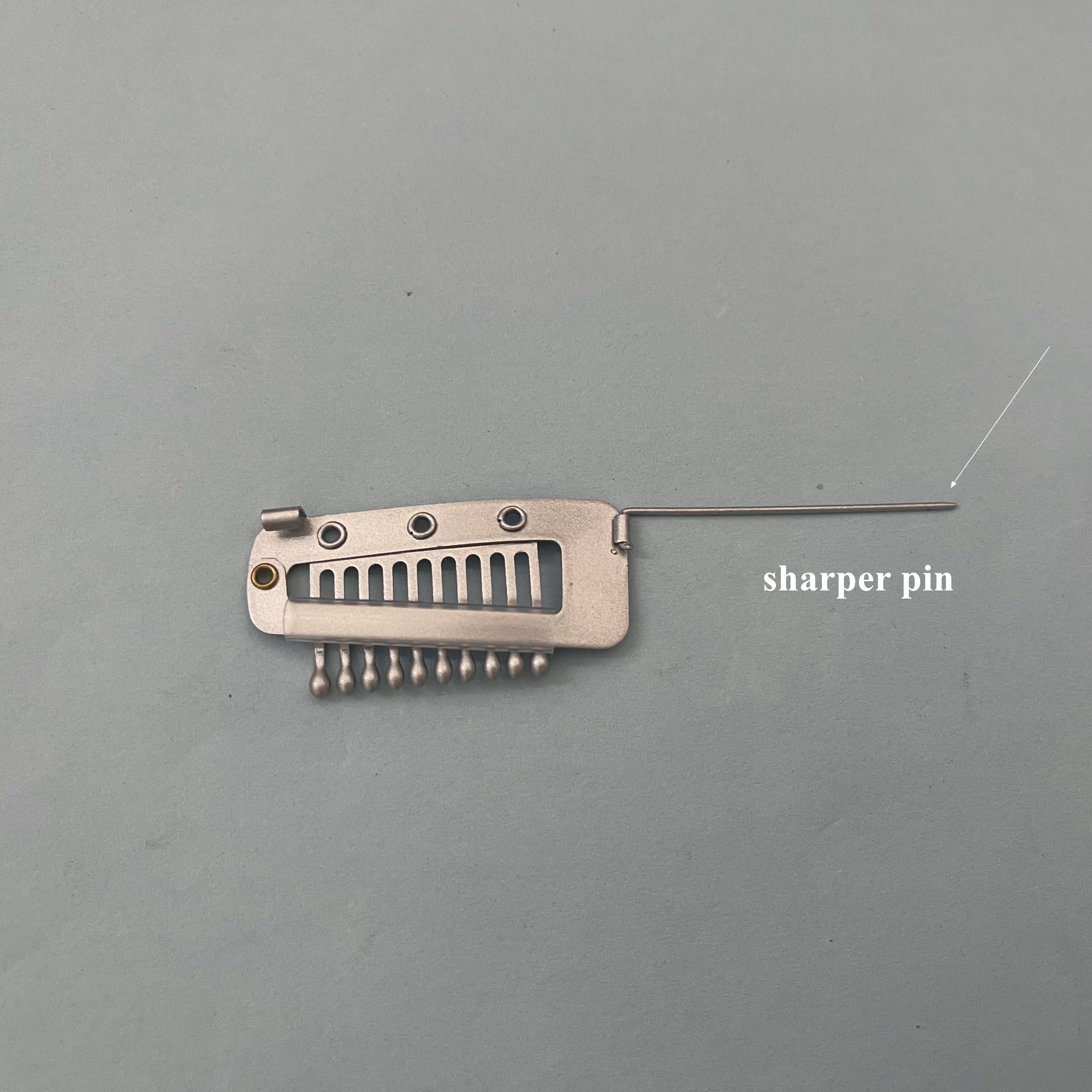 épingle argentée plus pointue