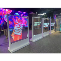 Pantalla LED Transparente Unilumin P3.91, Cartel Digital de Alta Transparencia con Clasificación IP54/55, Garantía de 3 Años para Escaparates