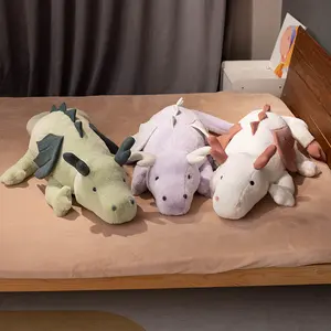 Directo de fábrica personalizado suave nieve dragón encantador nuevo juguete peluche dinosaurio con alas pequeñas muñeca Pterosaurio almohadas de felpa