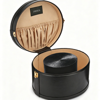 Boîtes de présentation de luxe noires pour chapeaux de baseball à motifs floraux, boîtes rondes portables en cuir personnalisées pour le rangement et l'emballage de chapeaux hauts de forme, idéales comme coffret cadeau.