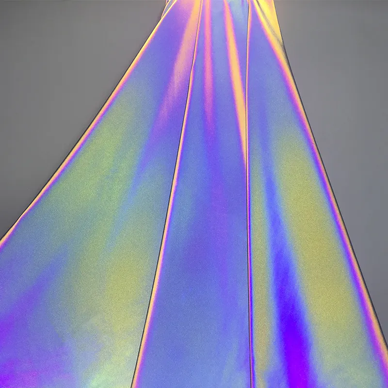 Tela reflectante de poliéster TC, material reflectante iridiscente de Alta Luz en rollo para coser en ropa