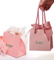 Petits sacs en papier pour bijoux de luxe Emballage cadeau de bijoux avec logo en aluminium Sacs à provisions en papier rose avec nœuds