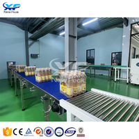 Nouvelle ligne de production complète Peak pour l'huile comestible et l'huile de coco, machine de remplissage et de bouchage de bouteilles d'huile de cuisson