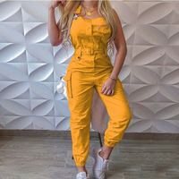 Combinaison de travail pour femmes à la mode avec design de poche et bandoulière sans manches ensemble de leggings minimalistes chics avec ceinture