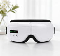 Masseur oculaire pliable en gros JY008 avec compresse chaude, vibration et musique – Appareil de soin des yeux pour coffrets cadeaux