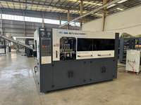 Machine de soufflage par étirage automatique à 4 cavités pour bouteilles en PET, avec PLC Mitsubishi et composants SMC, pompe pour bouteilles d'eau en plastique (Modèle MT-400)