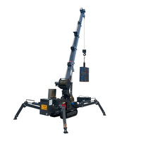 Grue araignée hybride diesel-électrique à structure facilement démontable pour le montage de panneaux de verre sur les immeubles de grande hauteur
