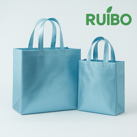 Sac à provisions non tissé personnalisé de haute qualité sac fourre-tout laser bon marché avec longue poignée pour un usage quotidien pour le stockage de vêtements
