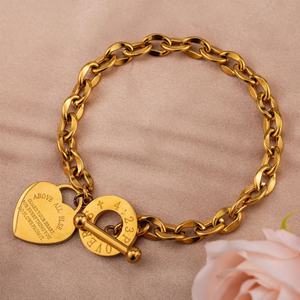 Bracelet et jonc anti-ternissement en acier inoxydable plaqué or 14k 18k, fin et élégant, avec breloque cœur, pour femme - Product Image 1