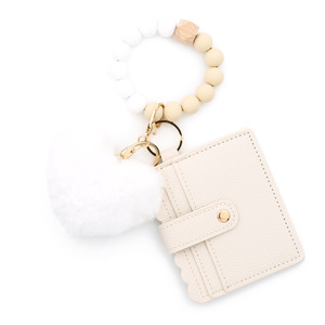 Porte-clés 2026 en cuir PU avec breloque peluche douce en forme de boule de poils, fermoir mousqueton et porte-cartes pour femme - Product Image 4