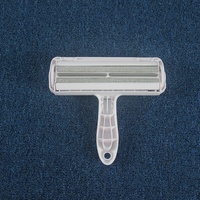 Brosse anti-poils en plastique de type rouleau pour animaux de compagnie, déchirable et lavable, avec raclette pour vêtements