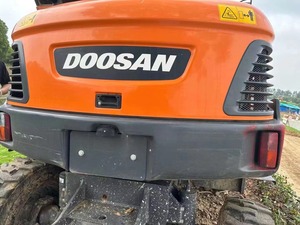 Excavatrice sur pneus Doosan 6 tonnes DX60W d'occasion avec boîte de vitesse pompe moteur et PLC fabriquée en Corée à vendre - Product Image 2