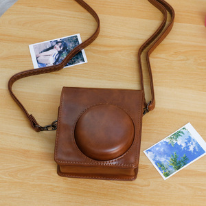 Sac en cuir PU pour appareil photo instantané pour <span class=keywords><strong>Instax</strong></span> <span class=keywords><strong>Mini</strong></span> <span class=keywords><strong>40</strong></span> sac en cuir PU avec poche et bandoulière réglable - Product Image 4