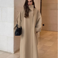 Manteau long élégant pour femme en polyester tissé, manches chauve-souris, coupe ample, couleur unie, col montant, nouvelle collection automne-hiver 2026