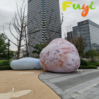 Sculpture géante gonflable personnalisée en forme de roche pour aménagement paysager, place commerciale, installation artistique extérieure