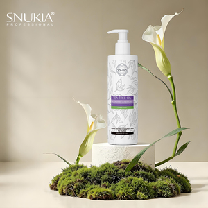 Snukia น้ำมันทีทรีเบสน้ำหนักเบาครีมบำรุงผมซ่อมแซมผมเสีย - Product Image 1