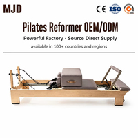 Machine de Pilates Reformer avec logo personnalisé, cadre en bois, barre intégrée, coussin en cuir, fournisseur OEM ODM pour la maison et les studios commerciaux