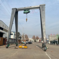 Grúa Pórtico de Bajo Ruido con Ruedas de Goma y Motor de Rotación 360°, Capacidad de Elevación de 2-350 Toneladas, Control Terrestre/Remoto