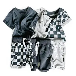 湾曲した裾とハーレムの子供キッズポケットTシャツショーツボーイズガールズユニセックスTシャツショーツ2ピース衣装