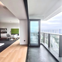 Système de porte en verre minimaliste en alliage d'aluminium Porte pliante pour balcon extérieur