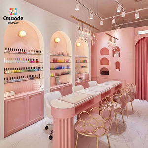 การออกแบบร้านทำเล็บสุดหรูทันสมัยพร้อมผนังโค้งสำหรับจัดแสดงสินค้า เฟอร์นิเจอร์สั่งทำพิเศษสำหรับสตูดิโอความงามที่ถ่ายลงอินสตาแกรมได้ - Product Image 1