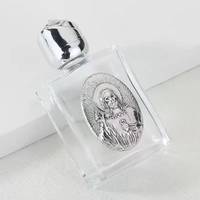 Bouteille en verre rose à motif de saint Boutique Bouteille d'eau en métal or et argent antique Bouteille de baptême religieux