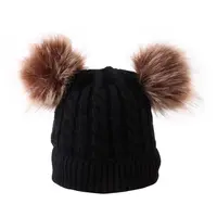 赤ちゃんと子供のためのポンポン付きのホットセールカスタムロゴニットニット帽帽子冬のビーニー帽子