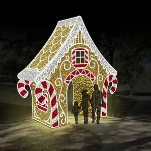 Grande passeggiata attraverso la decorazione di natale della luce di motivo all'aperto della casa di pan di zenzero 3D