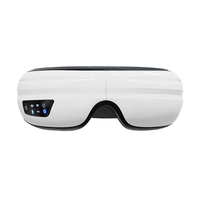 Dent bleue et musique Masseur relaxant pour les yeux avec compresse chaude chauffante et vibration Masseur pour les yeux confortable pour l'échauffement des yeux