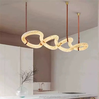 Lustre en résine imitation albâtre, luminaire suspendu en forme d'anneau torsadé, lampe LED d'art moderne, éclairage intérieur créatif pour villa, hall d'entrée, restaurant.