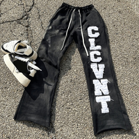 Fabricants de vêtements appliques personnalisées patchs brodés graphiques pantalons de survêtement évasés empilés lavage à l'acide pantalons évasés de survêtement pour hommes