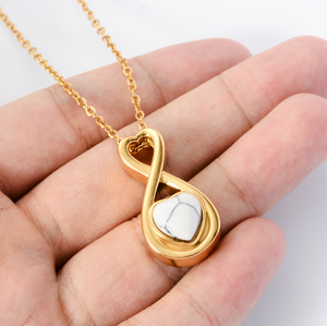 สร้อยคอสแตนเลสสตีลสีทองสไตล์ยุโรปและอเมริกาจี้รักนิรันดร์สามารถเปิดขวดน้ำหอมเถ้าที่ระลึก - Product Image 4