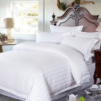 Parure de lit de luxe hôtelière 100% Coton 300TC tissé jetable toutes saisons moderne quatre pièces 1cm/3cm satin personnalisé Grade A 2.0m