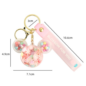 Vente en gros de perle d'huile tête de <span class=keywords><strong>Mickey</strong></span> coulant sable porte-clés pendentif boucle personnalisé livre sac acrylique poupée pendentif - Product Image 2