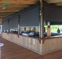 Porte à enroulement verticale en aluminium de haute qualité, design industriel moderne, avec dispositifs de sécurité pour entrepôts
