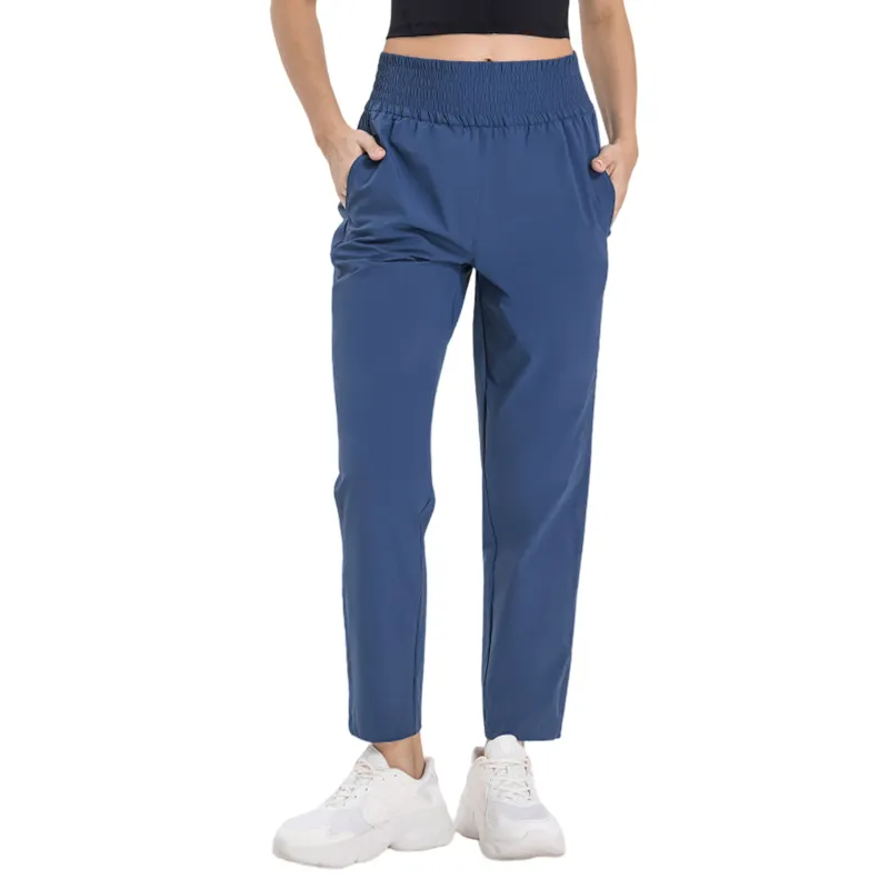 Fabricante personalizado Yoga Fitness Deporte Mujeres Leggings Entrenamiento Pantalones casuales sueltos Pantalones deportivos para correr de secado rápido