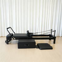 Reformer Pilates en aluminium noir mat avec rail complet et accessoires complets, lit de base professionnel pour studio