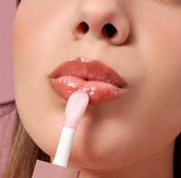 Huile à lèvres hydratante repulpante à marque privée, avec votre logo, tube rose, saveur fraise, végane