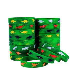 Pulsera de silicona con diseño de dinosaurio, paquete de 6, color verde con patrones coloridos de dinosaurios para decoración infantil, pulseras no tóxicas - Product Image 1