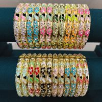 Vente en gros mixte de bracelets en émail cloisonné de haute qualité, colorés, résistants à l'usure, plaqués or 18 carats, avec motifs floraux en relief, cadeaux pour femmes
