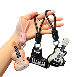 JUNQIAN Leather Guitar <b>Keychain</b> Piano Charm Cut Bag Pendant Soft Eco-Friendly for Girls Wholesale 2026 - Product Image 1