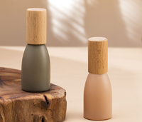 Bouteille de parfum Morandi de 12ml avec bouchon en noyer Bouteille d'huile essentielle à bille avec bouchon en hêtre givré Bouteille de décantation de parfum