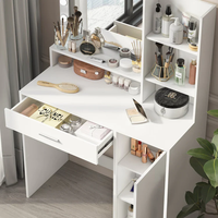 Bureau de maquillage VEYES avec miroir et éclairage, construction en verre et métal, boîtes à cils