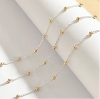 Collier plaqué or 18 carats S925 pour femme Matériau en argent 925 avec conception de niche Chaîne nue contrastante Perle de couteau incurvée