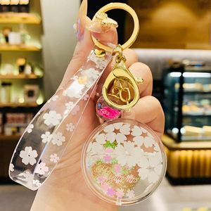 Joli porte-clés pendentif en forme de cœur avec fleur de cerisier, bouteille d'huile, accessoires pour sac, porte-clés de voiture, pendentif liquide Kawaii, cadeau - Product Image 3