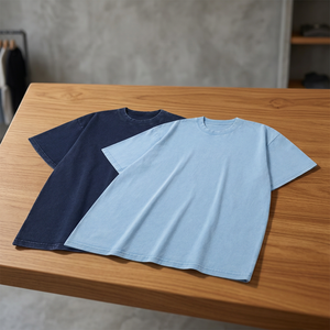 เสื้อยืดโอเวอร์ไซส์แขนสั้นผ้าเจอร์ซีย์คอตตอนสีพื้นสำหรับผู้ชายและผู้หญิง ชุด 2 ตัว ดีไซน์เรียบ สีดำ - Product Image 3