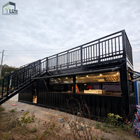 Bar-restaurant modulaire en conteneur maritime de 40 pieds, design personnalisable, préfabriqué, avec toit.