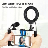 En stock PULUZ Kit de support vidéo pour smartphone avec anneau lumineux LED RGBW 4-en-1, microphone, trépied de poche et griffe porte-accessoire pour Vlogging Bleu