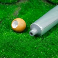 Tube cosmétique vide en aluminium et plastique OEM avec bouchon en bois de hêtre pour emballage de produits de beauté
